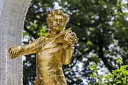 Austria, Vienna, gold plated statue of Johann Strauss at the city park ...
