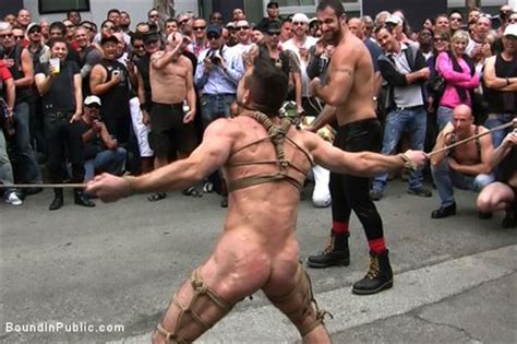 Muscle Slave Is Stripped Naked Used And Humiliated While Hordes Of