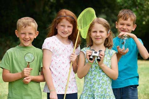 Group Of Children Exploring Nature Together Stock Image - Image of ...