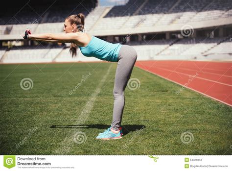 Female Runner Stretching Preparing For Training Fitness Sportswoman