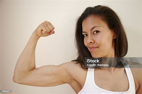 Woman Flexing Bicep Stock Photo Download Image Now Bicep Women
