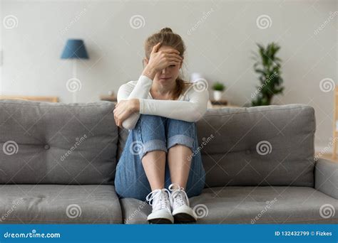 Unhappy Female Sit On Couch Feeling Sad At Home Stock Image Image Of