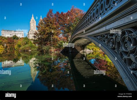 Bow Bridge Reflected Into The Lake Central Park Manhattan New York