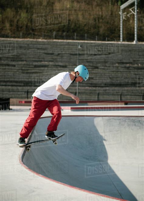 Young Man Doing Skateboarding Trick Outdoor Stock Photo Dissolve