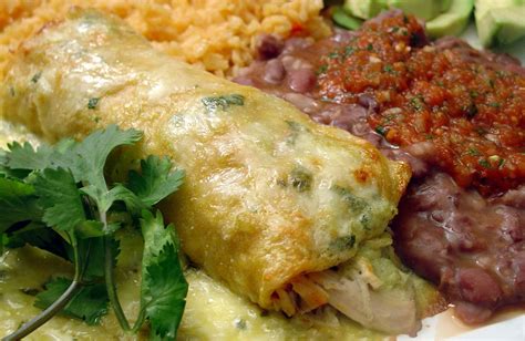 Everyone will be begging for more when you make these sour cream enchiladas, and no one will believe there's absolutely no dairy involved! Skinny Sour Cream & Chicken Enchiladas Recipe | SparkRecipes