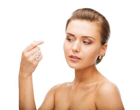 Premium Photo Beauty And Jewelry Concept Woman Wearing Shiny Diamond Earrings