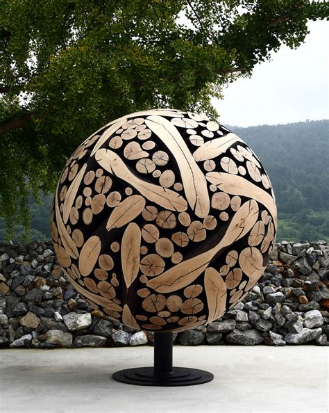 Wood Sculptures Created Out Of Discarded Tree Trunks And