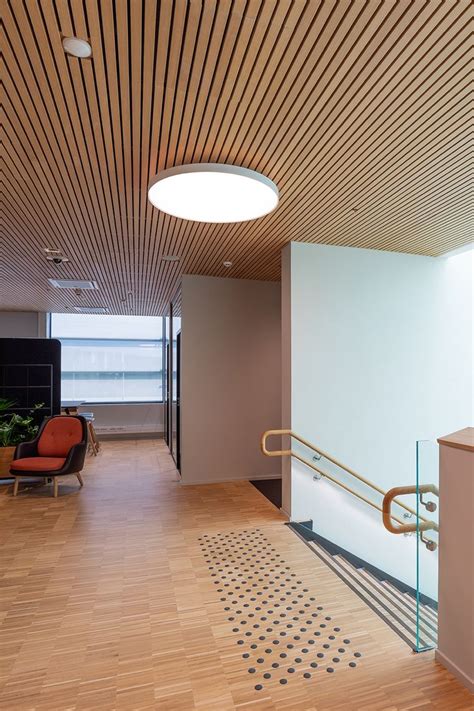 Suspended Slatted Wood Ceiling In An Office Space Wood Slat Ceiling
