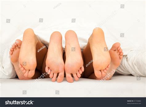 Three Pairs Feet Having Fun Bed Stock Photo Shutterstock