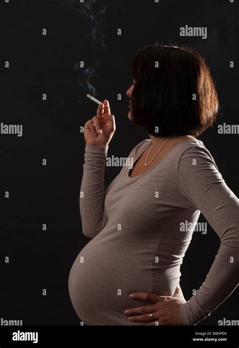 Mother Lighting A Cigarette Hi Res Stock Photography And Images Alamy