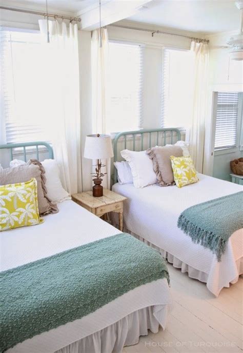 Bright And Beach Themed Twin Beds In A Guest Room