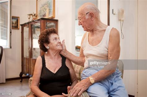 Old Couple Cuddling Photo Getty Images