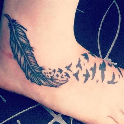 Sweet Feather Turning Into Birds Tattoo On Foot Foot Tattoos Tattoos