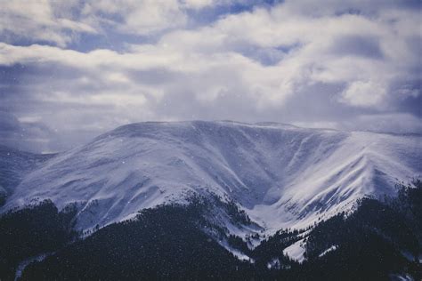 Snow Covered Rocky Mountain · Free Stock Photo