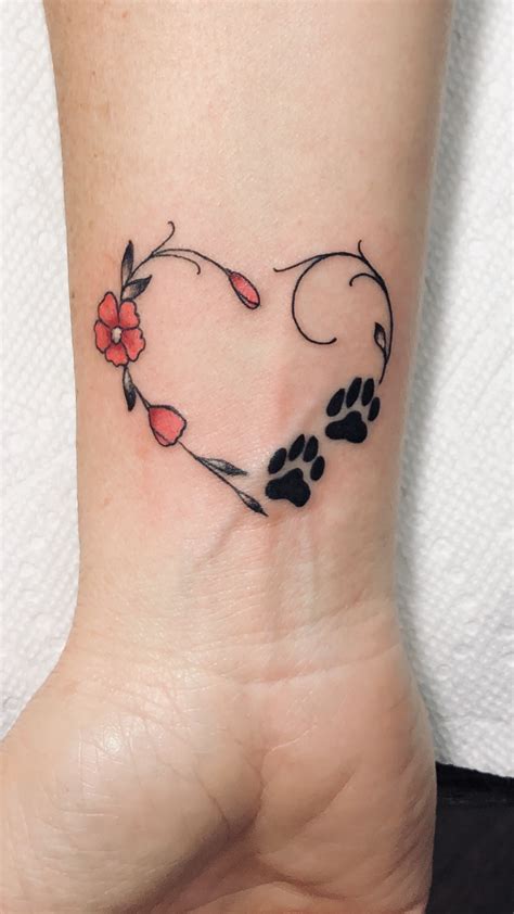 Heart With Flowers And Dog Paw Prints Tattoo Done By Inkhouse 203