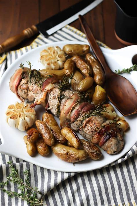 Pour the olive oil over the pork loin, potatoes, and garlic evenly. One Pan Herb Roasted Pork Loin, Potatoes, and Garlic ...