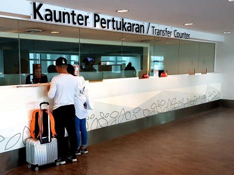 This means the parts of the airport you need security clearance (or an airline ticket) to purchase taxi coupons or klia ekspres tickets just inside the exit doors into the arrival hall. Arrival Hall at the klia2 | Malaysia Airport KLIA2 info