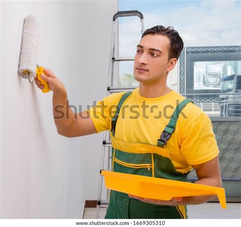 Man Painting Wall Diy Concept Stock Photo 1669305310 Shutterstock