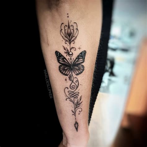Colorful feminine flowers tattoo on half sleeve. Tattoo uploaded by Marloes Lupker | Cute unalome arrow ...