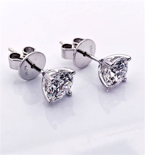 For more versatility, consider combining your diamond studs with a gorgeous pair of earring jackets. Quality Diamond Stud Earrings 1 Carat Each 18K GIA ...
