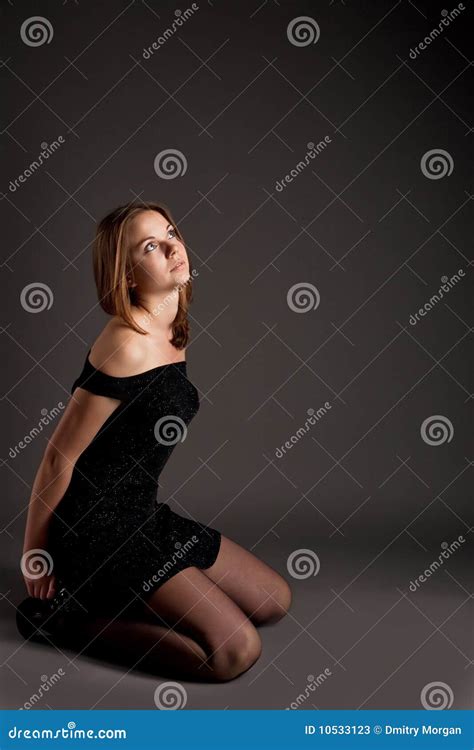 Sensual Blonde Sitting On Knees Stock Photos Image
