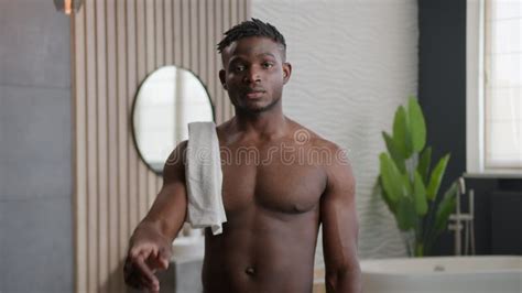 African American Bare Naked Man Serious Strong Guy Millennial In Bathroom Shaking Index Finger