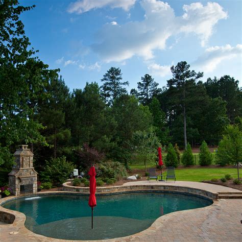 Elegant Three Tier Pool Design With Fireplace By Shane Leblanc