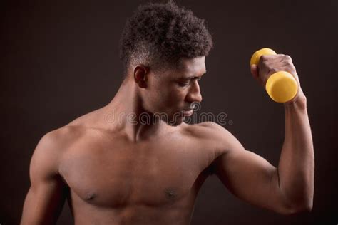 Naked Male Model Getting Out Of Bubble Bath With Skin Lit By Candles In