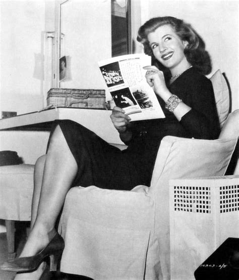 Books And Art Corinne Calvet Reads While Relaxing In Her