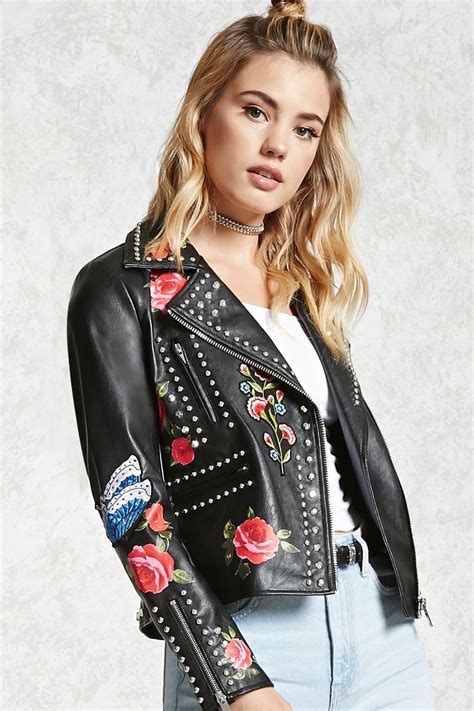A Faux Leather Moto Jacket Featuring A Printed Floral Design Embroidered Accents High Polish