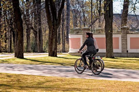 Riding A Bike In The Park Editorial Photography Image Of People