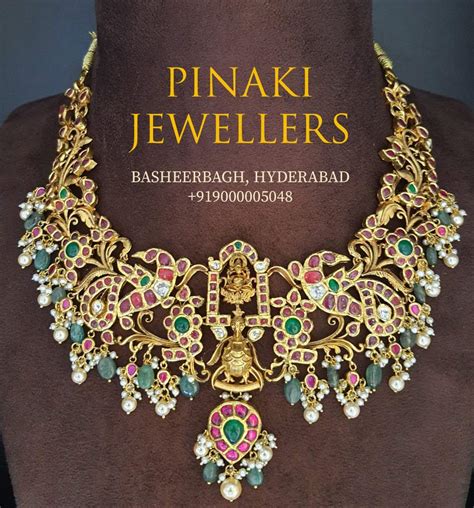 Antique Gold Kundan Peacock Necklace With Lakshmi Pendant