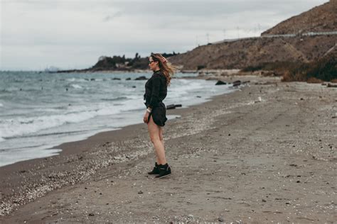 Free Photo Woman Standing On Seashore Beach Waves Water Free
