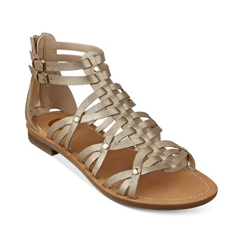 G By Guess Hendal Gladiator Sandals In Gold Lyst