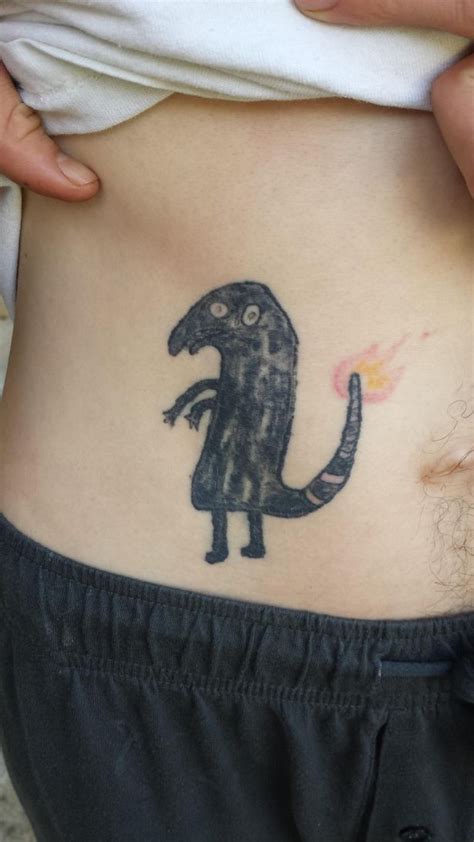 This Mans Drunken Diy Charmander Tattoo Is The Worst Body Art Weve