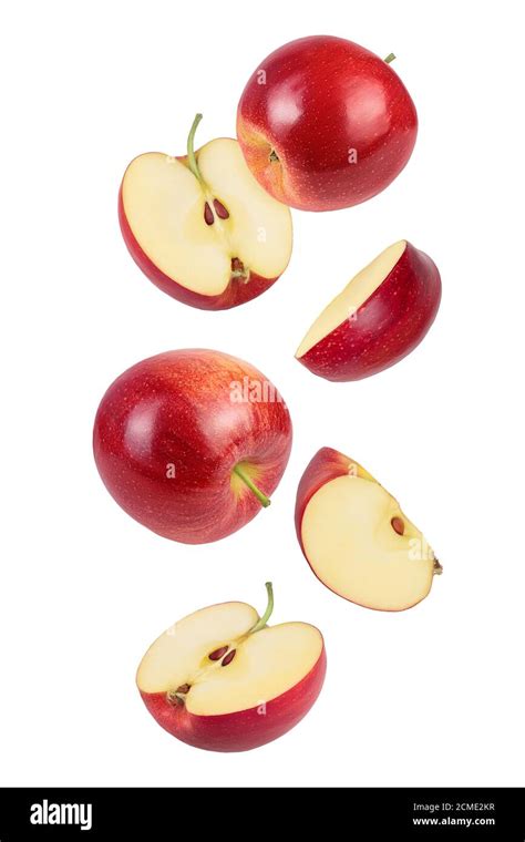 Falling Red Apple Slices Isolated On White Background Stock Photo Alamy