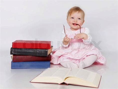 Baby Reading Book Stock Photo Colourbox