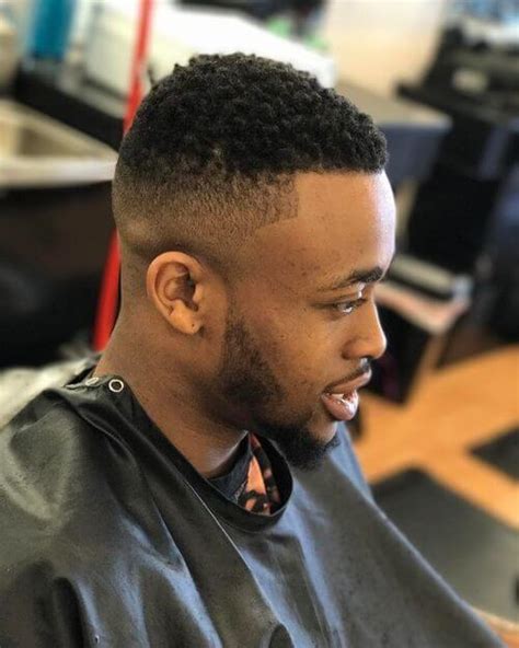 Giving this fade its name, the top of the head is dark, the middle section is low but visible, and the nape is practically bald. 46 Stylish Men's Fade Haircuts for Guys Wanting a Change
