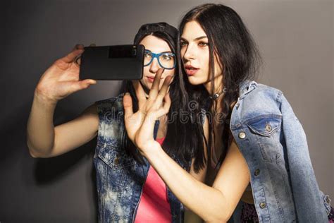 Two Caucasian Brunette Hipster Woman In Casual Stylish Outfit Having
