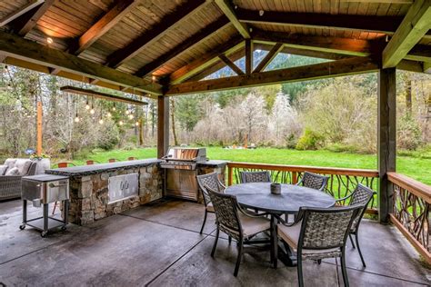 Covered Patio With Outdoor Kitchen And Dining Area For Six Hgtv
