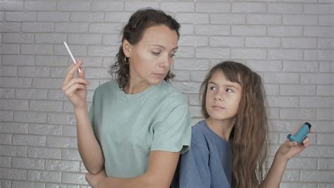 Girl Smoke With Her Mother