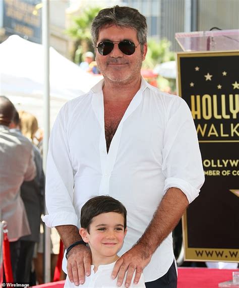 Talk Of The Town Simon Cowell Makes Sure Son Eric Has The T Rex Factor Daily Mail Online