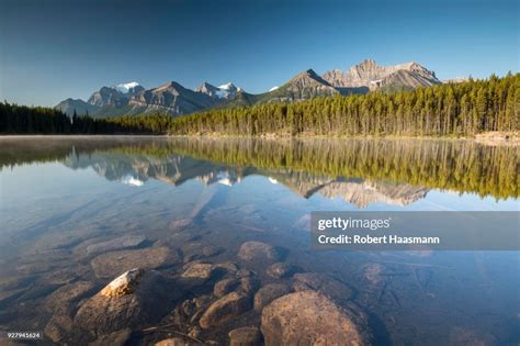 Herbert Lake With Morning Atmosphere Reflection Of The Bow Range Banff