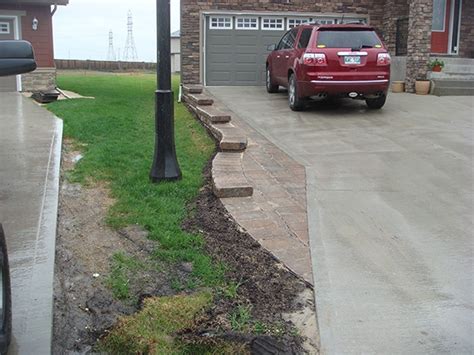 In landscape architecture , pavements are part of the hardscape and are used on sidewalks , road surfaces , patios , courtyards , etc. Roman Pisa retaining wall and Roman paving stones in ...