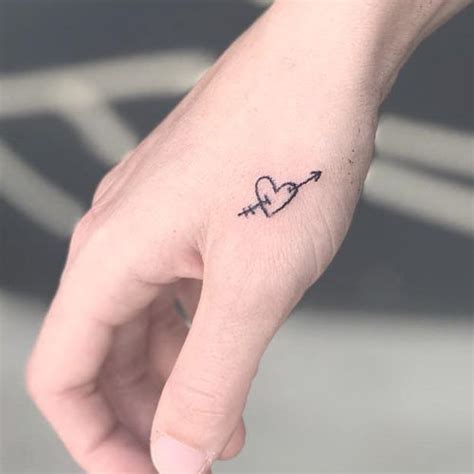Bea Miller Arrow Heart Back Of Hand Tattoo Steal Her Style