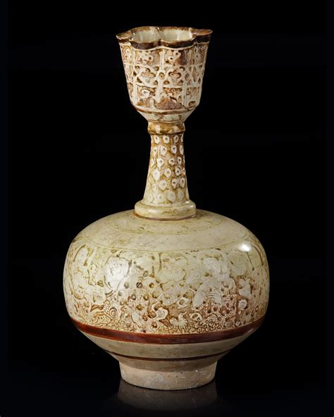 a kashan lustre pottery bottle vase persia early 13th century