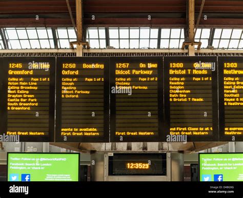 Electronic Noticeboard Showing Train Departures At Paddington Railway