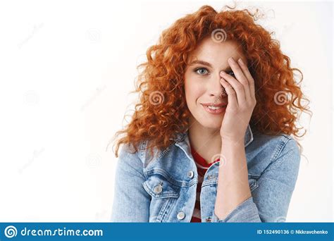 tender sensual feminine redhead european woman close half face look gentle happy camera smiling