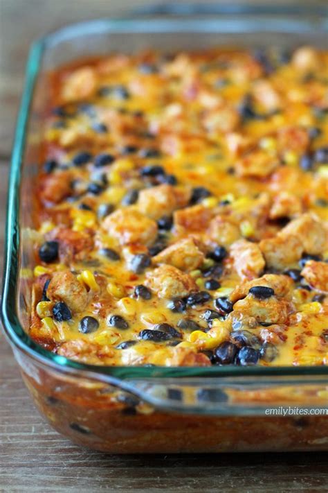 Sprinkle with half of chicken mixture and 1⁄2 cup cheese. Layered Chicken Enchilada Bake - Emily Bites
