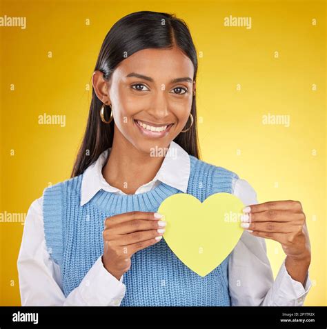 Portrait Heart Cutout And Smile Of Black Woman In Studio Isolated On A
